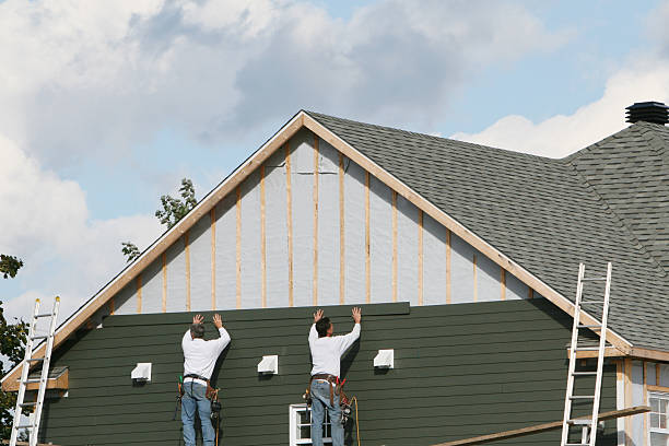 Professional Emergency Siding Repair technician working in Galion, OH